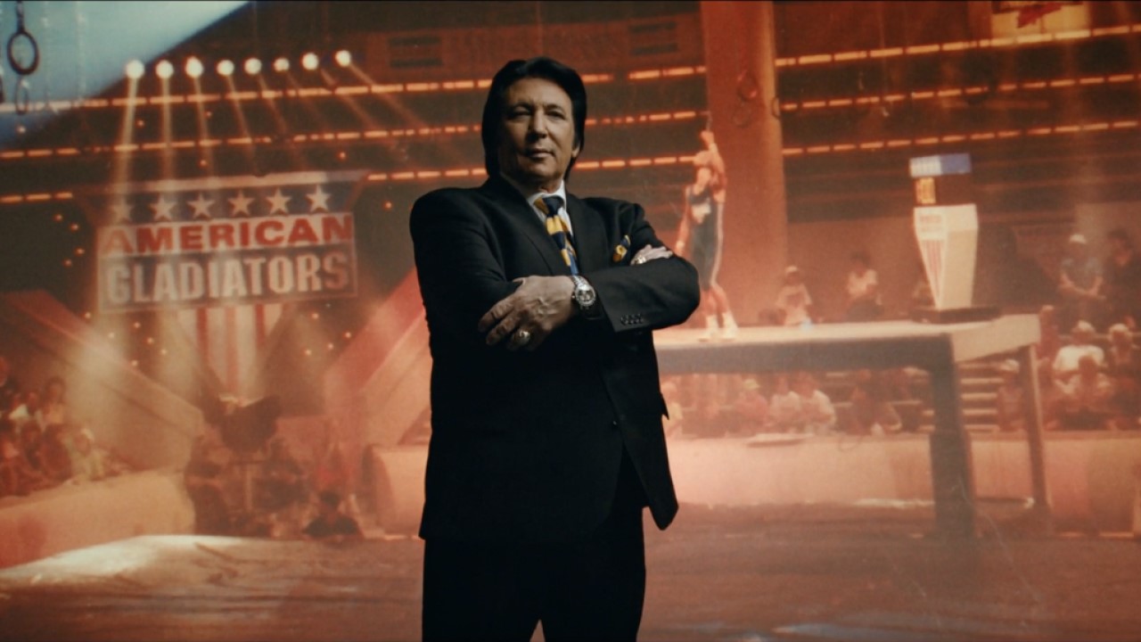 Man in suit in American Gladiators arena