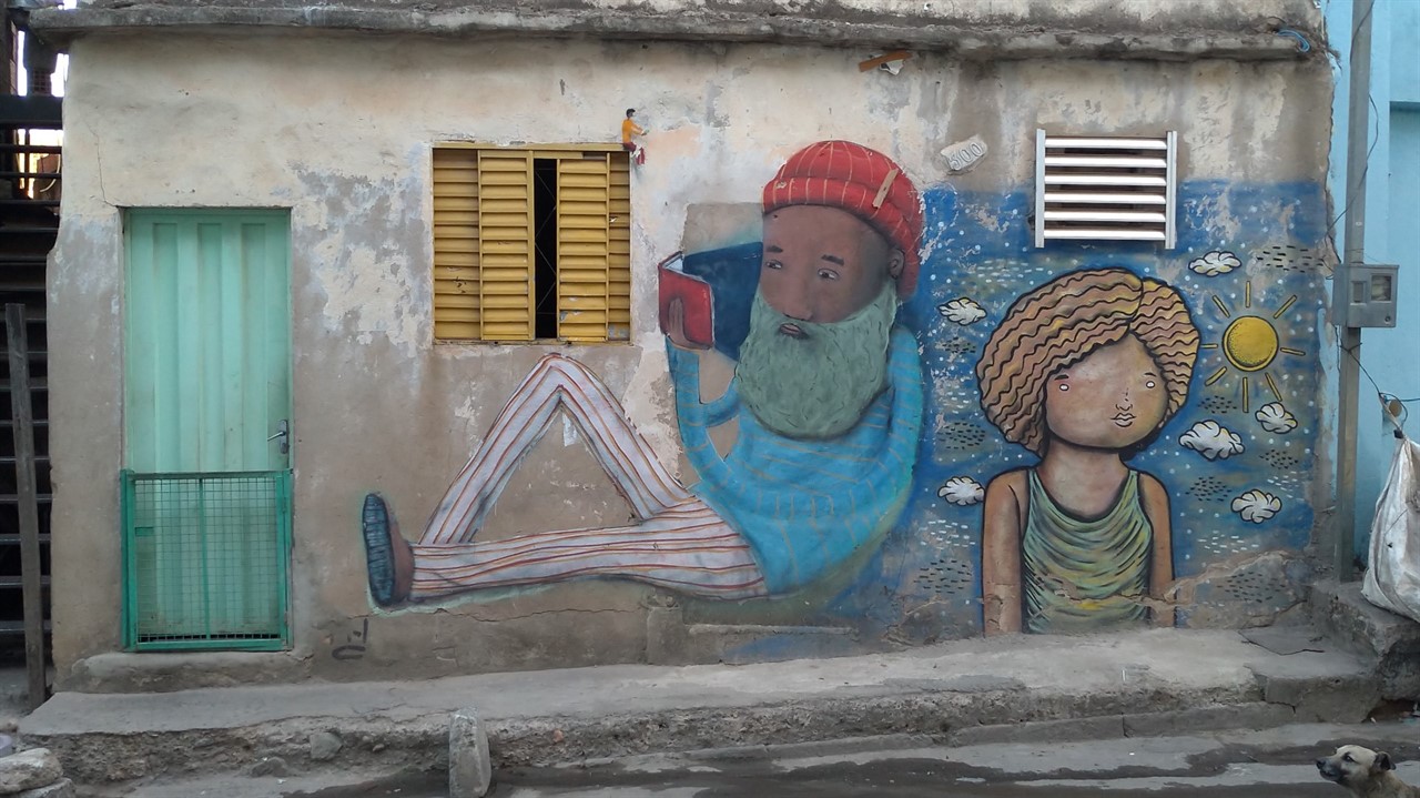 Mural of man reading and woman
