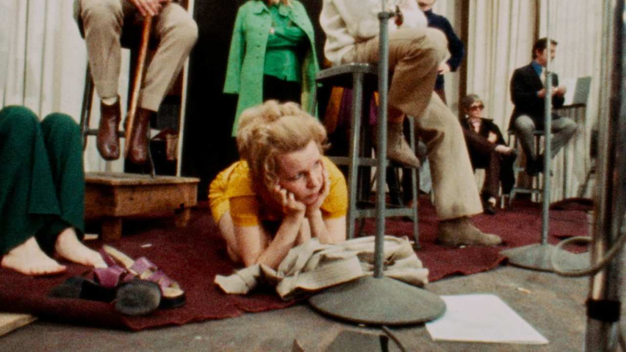 a woman sitting on the floor