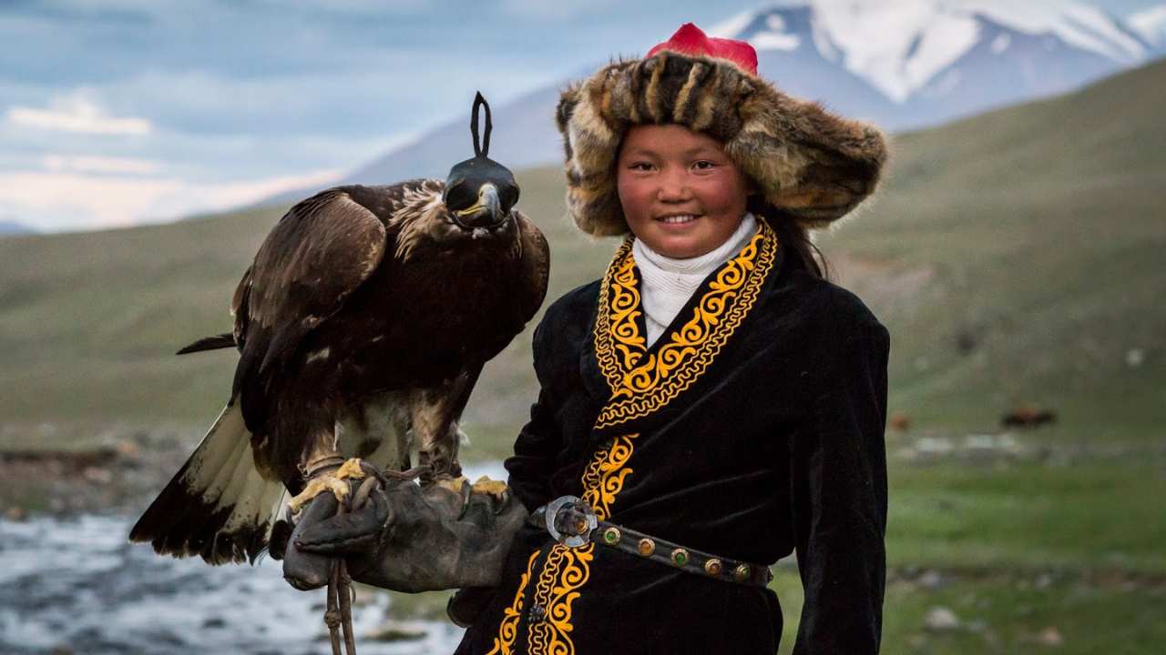 a girl with an eagle