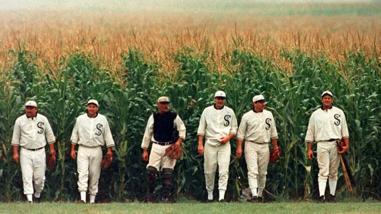 a group of baseball players walking together