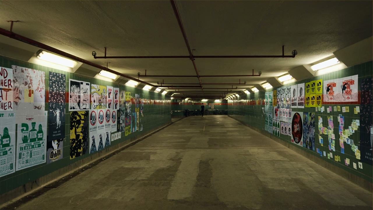 Underpass with posters on walls