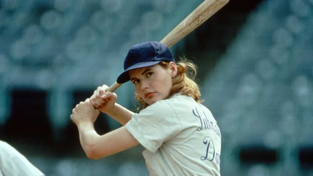 a woman playing baseball