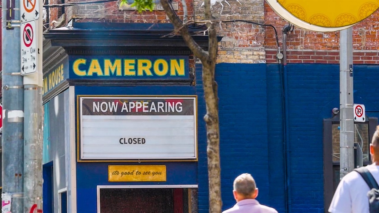 signage in front of a music venue