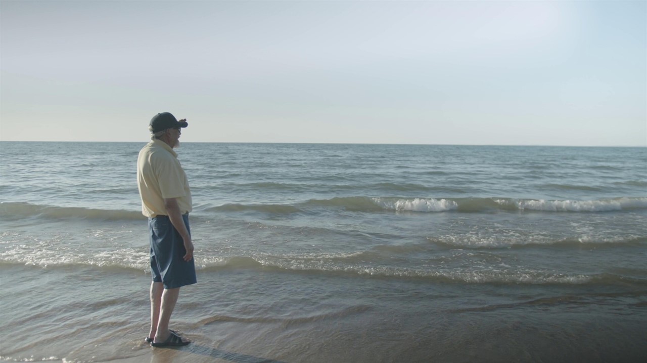 Man staring out at the ocean