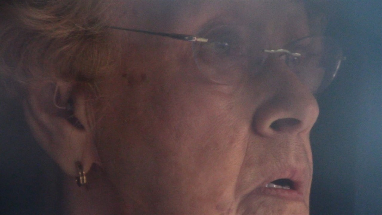 Closeup of a woman's face with glasses