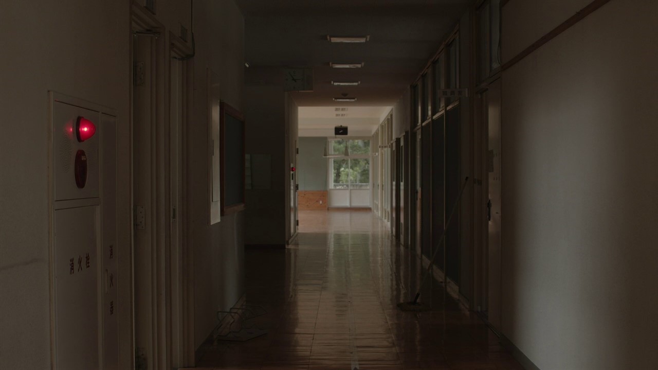Darkened school hallway