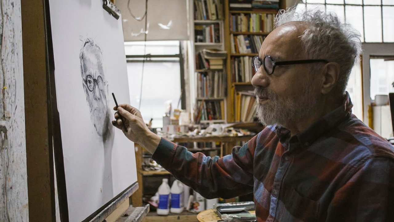 a man drawing a self portrait