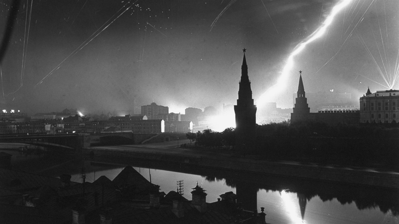 Archival image of lightning strike over a city
